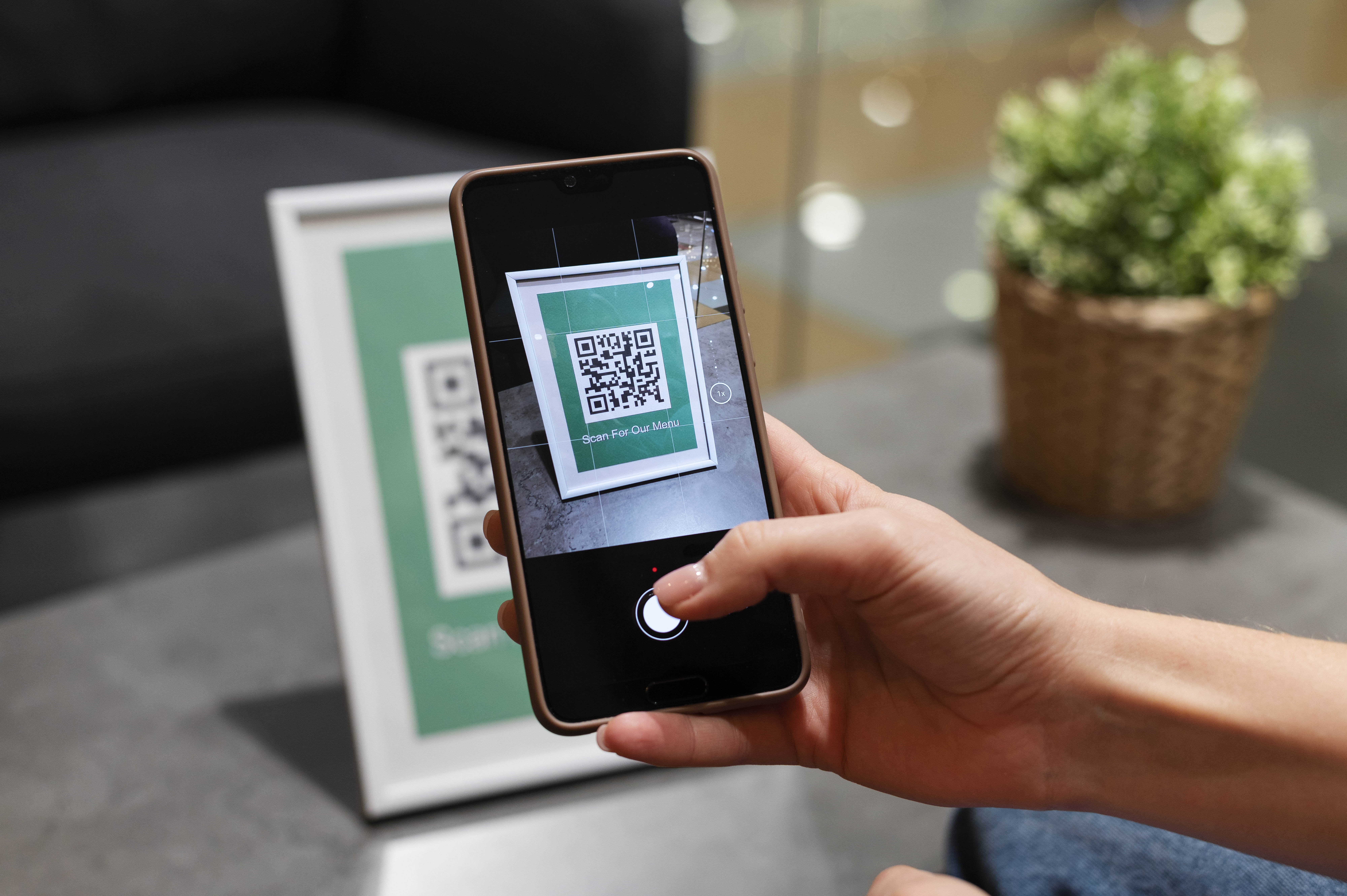 Customer scanning QR code